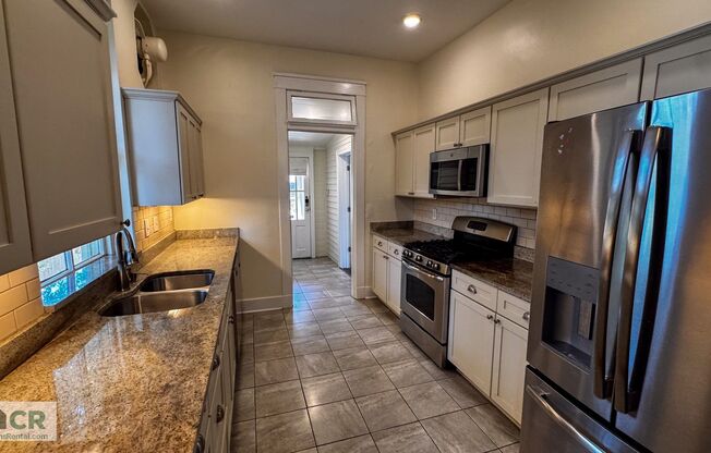 HUGE 9 bedroom house just a few blocks from campus! Text 727-459-4141 for more info.