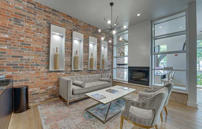 Community Room With Fireplace at Vue Greenville, Dallas, Texas