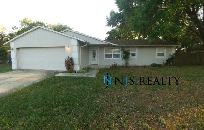 3/2/2 1400 Sq. Ft. with HUGE yard, GRANITE in the kitchen, tile floors, fully renovated interior