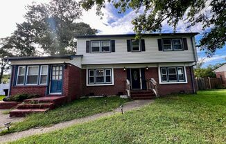 Colonial home in the desirable Hunters Point neighborhood