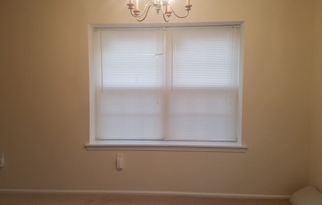 Updated, spacious, centrally located end-unit townhouse with lots of amenities in exclusive Governor's Pointe!