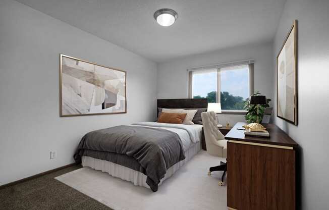 a bedroom with a bed and desk in a 555 waverly unit