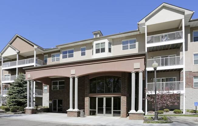 a picture of a building with a blue sky in the background