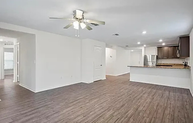 Like New 4/2/2 with screened in porch.