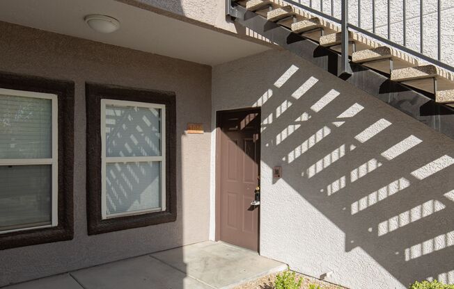 First floor unit in upscale gated SW community located near the 215 freeway