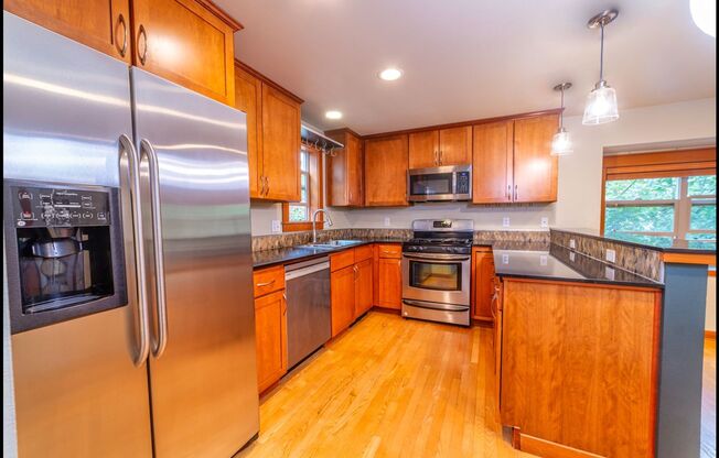 Beautiful 2BR/1.5BA Corner Townhome in the Heart of West Seattle | Private Yard + Garage