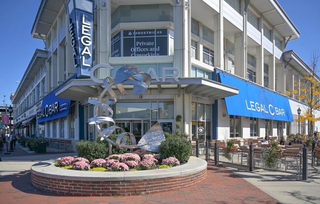 Legacy Place dining and shopping destinations, including local favorites like Legal C Bar, are just minutes from The Avens at Dedham.