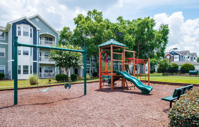 our apartments have a playground with a slide and swing set