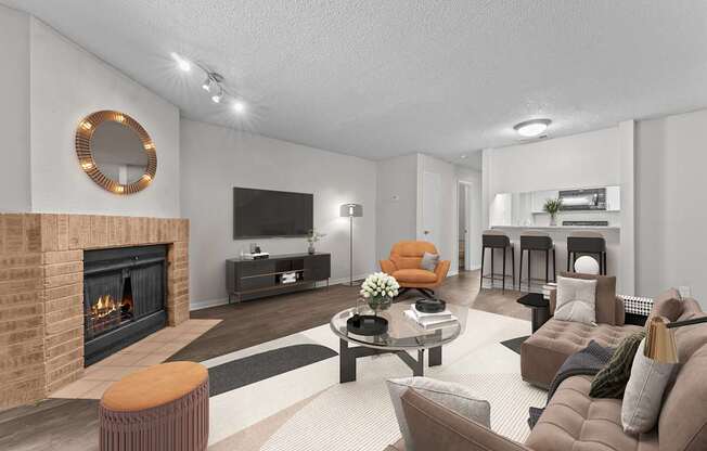 A modern living room with a fireplace and a television.