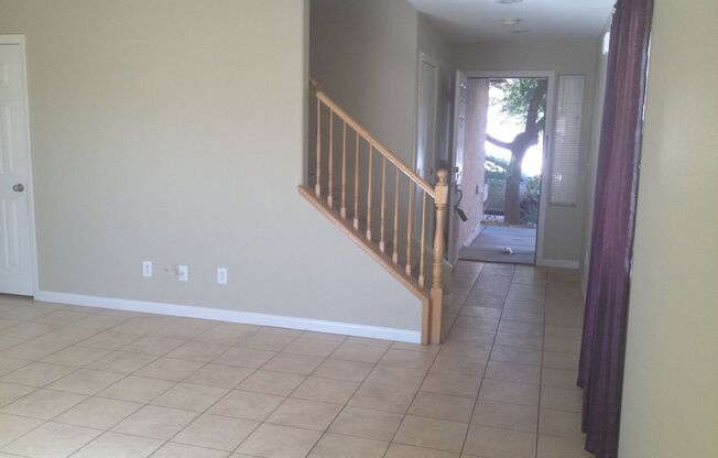 3 Bed/2.5 bath. All Tile Downstairs. Open Great Room floor plan.