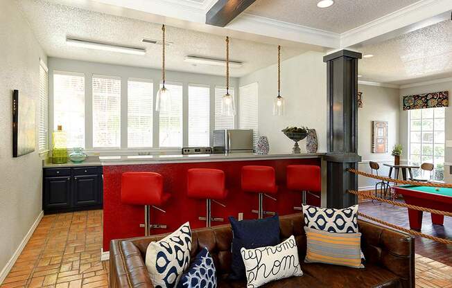 Kitchen with barstools in clubhouse