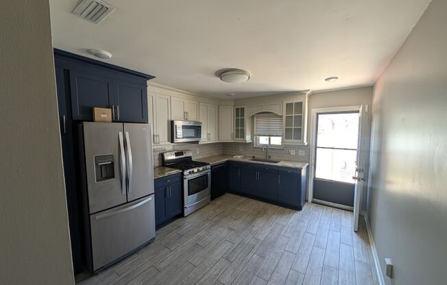 Beautifully Remodeled 2 Bed, 1.5 Bath Duplex with Privacy Fence