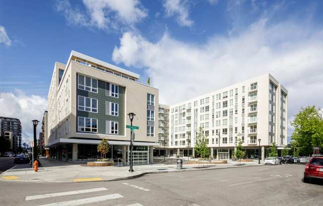 a view of an apartment buildings on the corner of a city street at Slabtown Square Apartments, Portland , Oregon