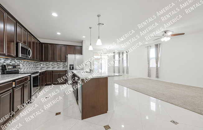 10915 E CALYPSO AVE