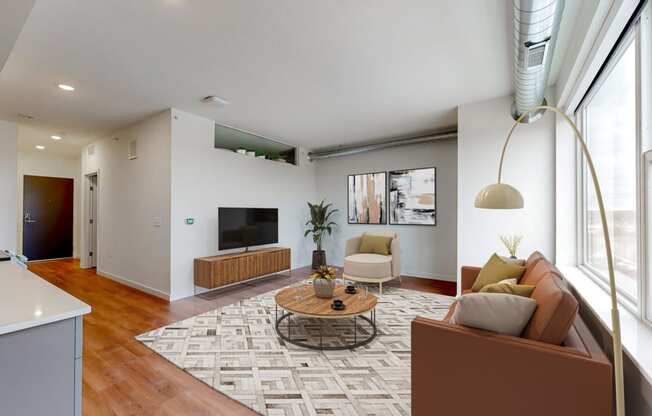 a living room with a couch and a table