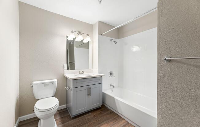 a room with a sink and a mirror