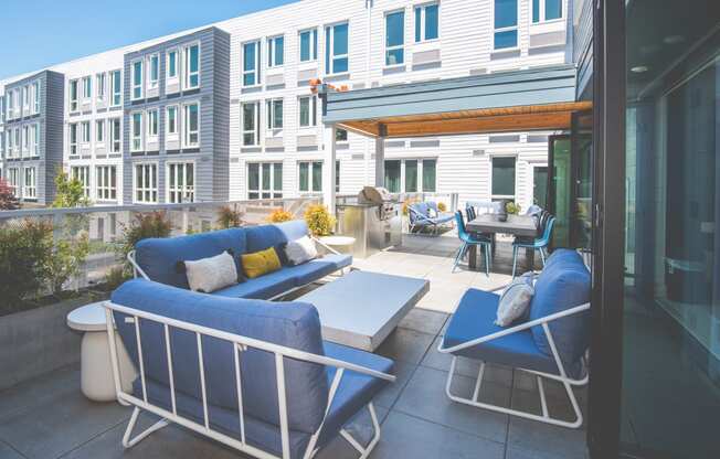 Meetinghouse Apartments Outdoor Lounge Area and BBQ Grill