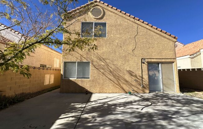 Newly renovated home with brand new kitchen and flooring downstairs! Home features a large living room with a fireplace and a separate family room! Brand new large kitchen cabinets and countertops! A large backyard! And is nearby the Summerlin Parkway hig