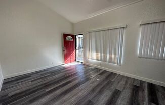 Beautifully renovated 2 bedroom one-bathroom unit with parking in upper level of building.