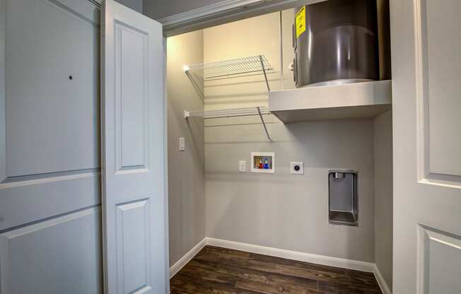 a small laundry room with a washer and dryer