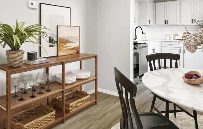 a dining room with a table and chairs and a kitchen in the background  at Sunset Heights, San Antonio