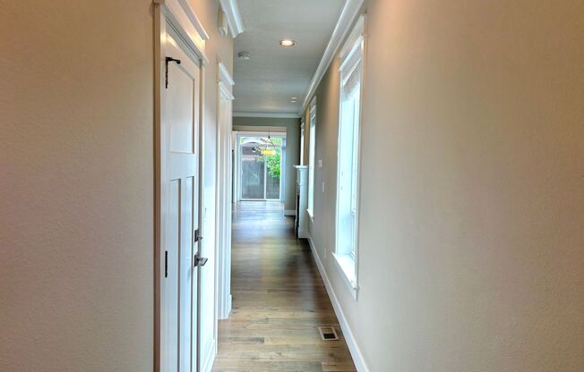 St. Johns Modern Build with Fenced Backyard, Attached Garage, Fireplace + A/C