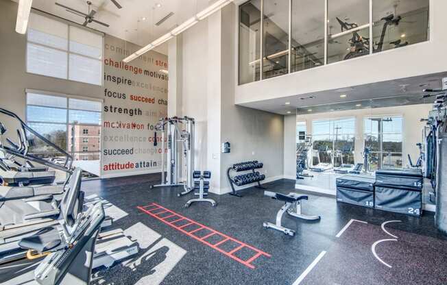 a photo of the gym at the bradley braddock road station apartments