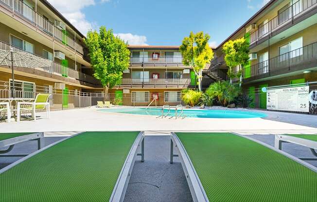 a swimming pool in the middle of an apartment building