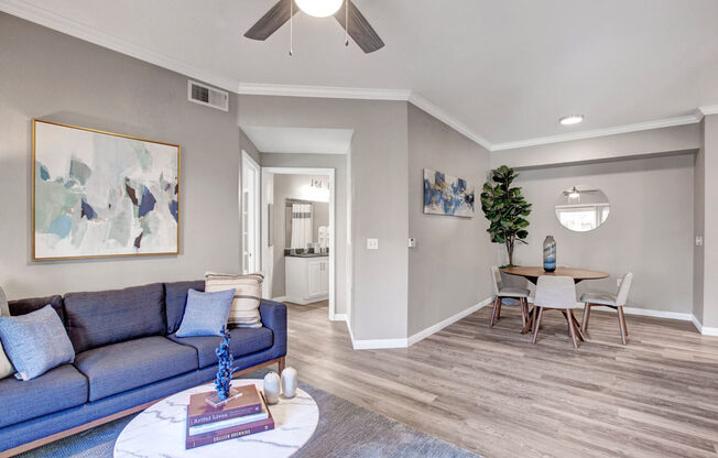 a living room with a couch and a table