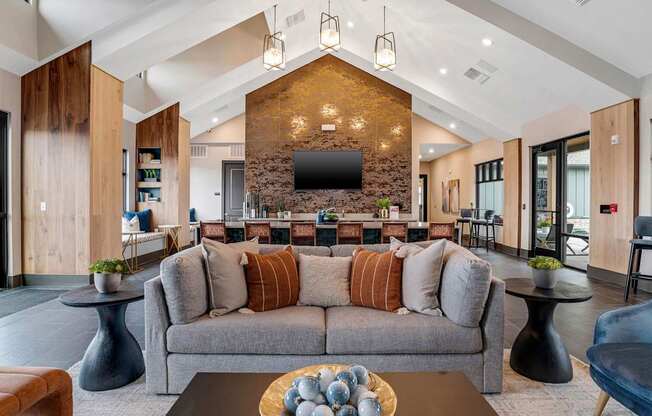 a living room with a couch and a table