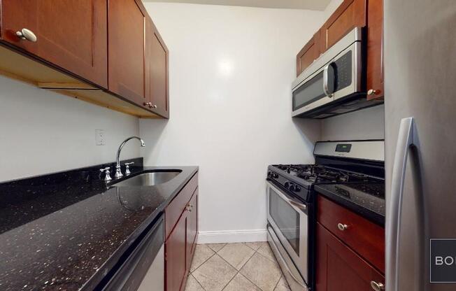201 205 W 11 ST