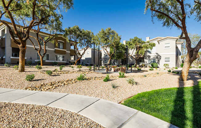 A residential area with houses and trees.