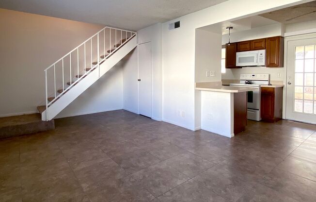 Great 3 bedroom and 1.5 bath townhouse with a small yard and 2 car garage.