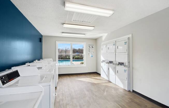 laundry room 
at Sabal Point Apartments in Pineville, NC