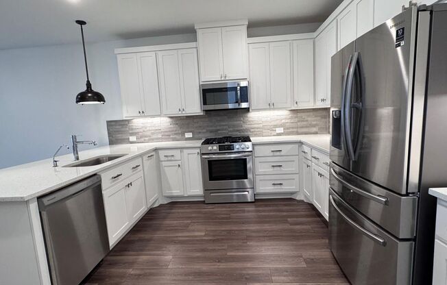 FULLY UPGRADED LUXURY TOWNHOME located in the heart of Frisco