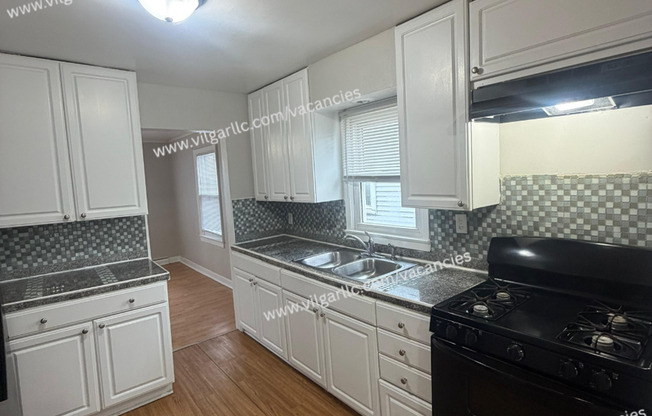 4 Bedroom • 2 Full Bath • 2-Car Garage • Fenced in Yard • Bonus Rooms • Appliances present