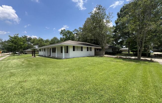 Welcome to 10444 Browning Dr. in the sought-after Broadmoor neighborhood!