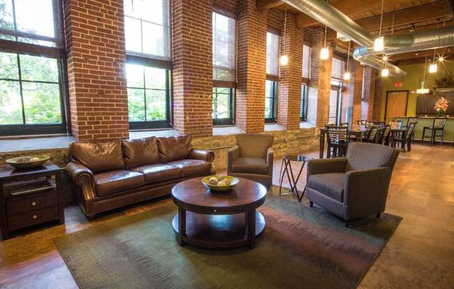 Lofts at Lafayette Square clubroom lounge area with seating and oversized windows