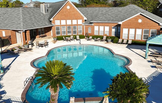 large swimming pool at an apartment building