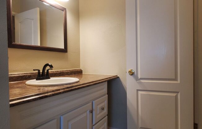 Spacious 2-Story Townhome, A/C, Remodeled Bathrooms, Fresh Paint, Patio, 2C Parking, Great Location!