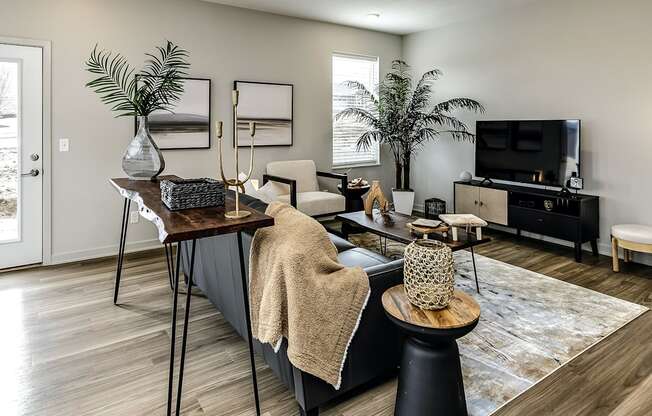 Two and three bedroom townhomes featuring golf course views, fill-size washer and dryer, stainless steel appliances, granite countertops, kitchen island, faux wood flooring and smart-home technology with keyless entry at Sandstone Villas in Omaha, NE