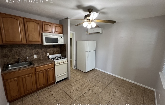 427 8 AVE N