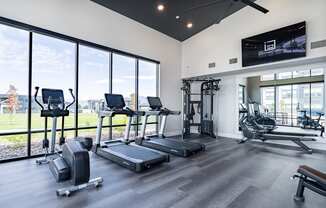 the gym at the flats at big tex apartments