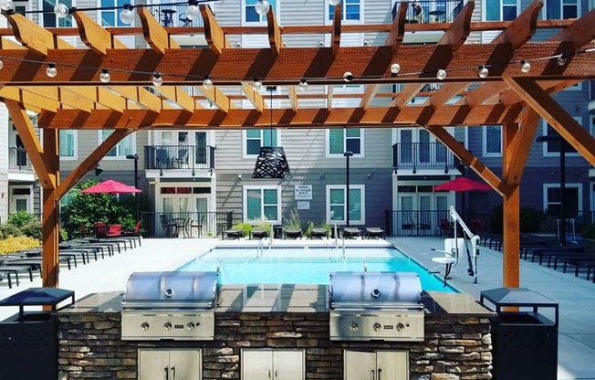 Poolside Sundeck And Grilling Area at Link Apartments® Brookstown, Winston Salem, NC, 27101