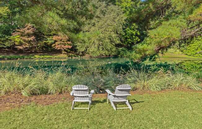2 chairs at lake