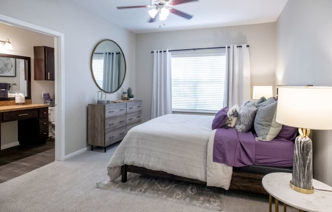 Main Bedroom with Ceiling Fan and Large Windows  located at Retreat at Steeplechase in Houston, TX 77065
