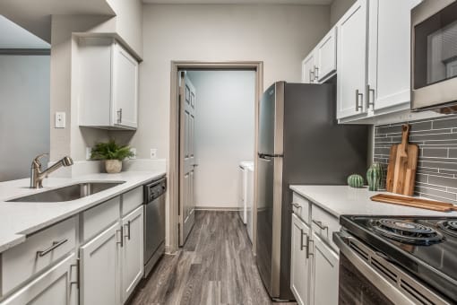 Chef-Inspired Kitchens Feature Stainless Steel Appliances at Canyon Ridge, Austin, 78753