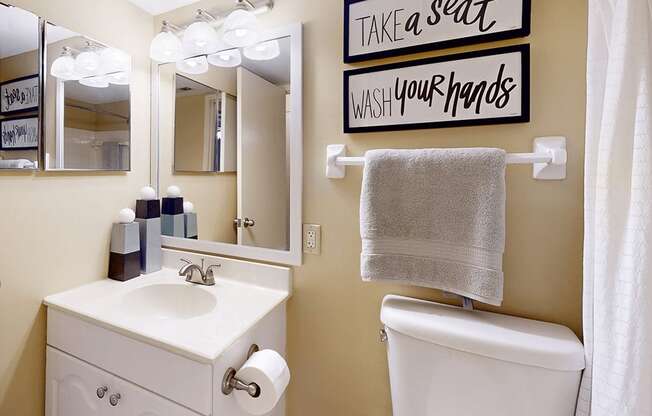 bathroom with a toilet and sink