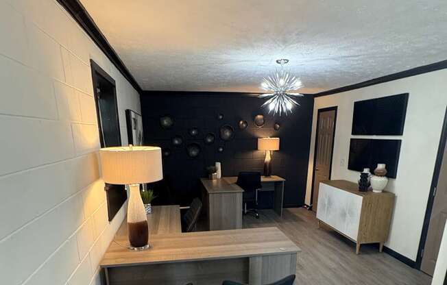 A modern kitchen with a black and white color scheme.