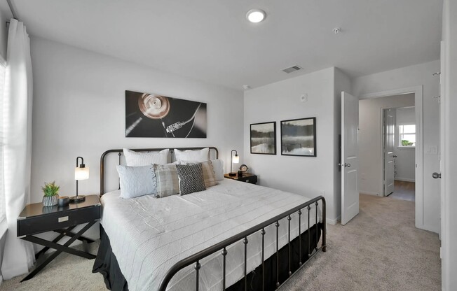 Discover serene living at Esperanza at Wild Orchid. This beautifully designed bedroom offers comfort and style, featuring modern decor and ample natural light. Experience a welcoming sanctuary today. Schedule your visit now!